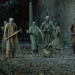 burial ground zombies coming towards the camera horror movie