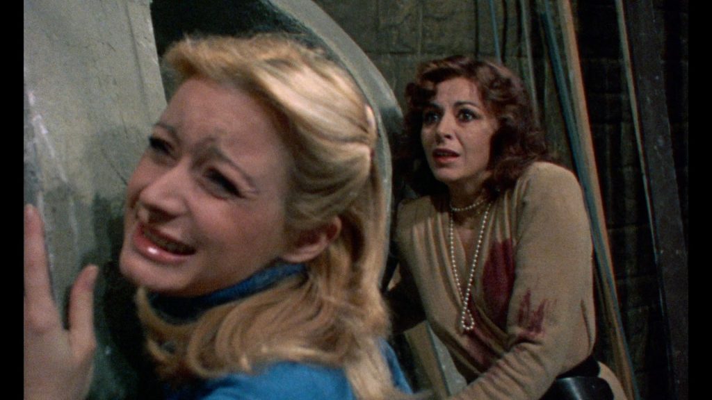 two women fend off an italian zombie attack in burial ground horror movie review